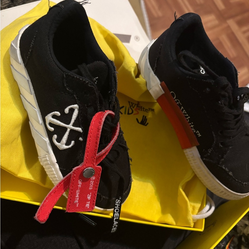 Off-White Black and White Sneakers with Mesh Fabric and Modern Design